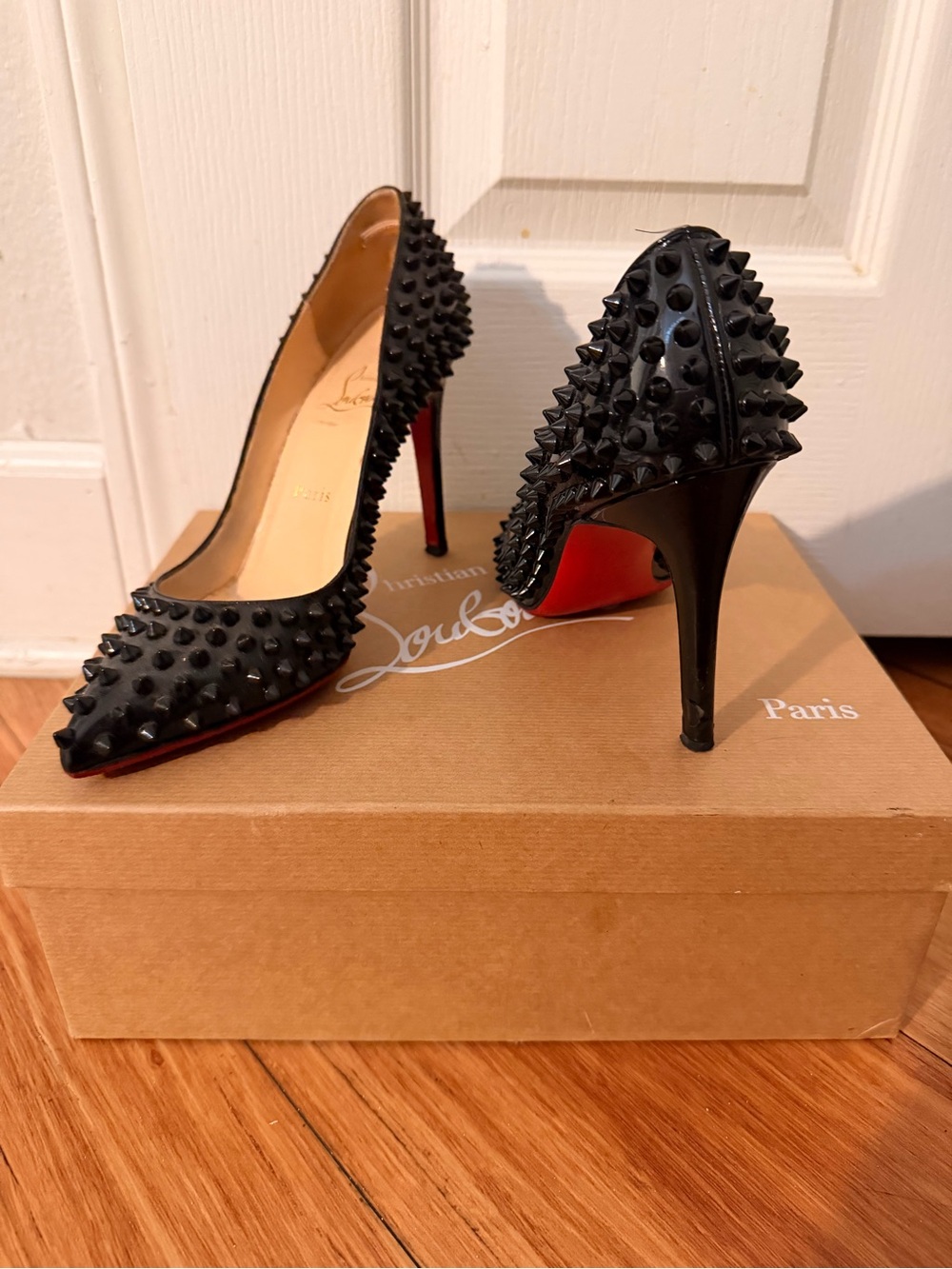 Christian Louboutin Black Spiked Patent Pumps with Red Sole